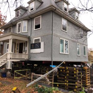 An old house lifted from the foundation - Payne Construction Services