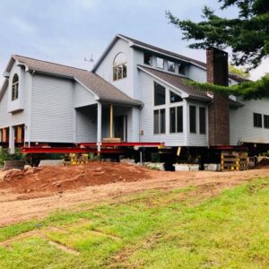 A modern home lifted at the frame - Payne Construction Services