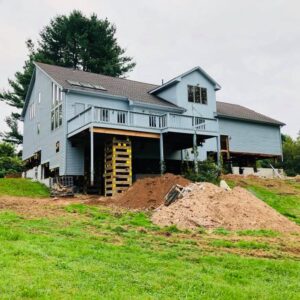 A whole house lifted from the foundation - Payne Construction Services