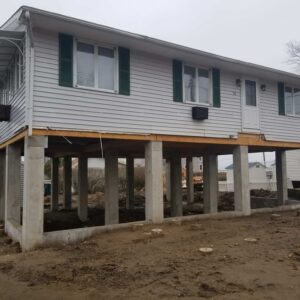 A concrete beam foundation on a home.
