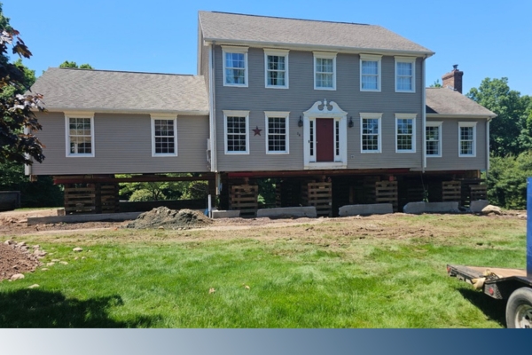 Home lifted for foundation replacement