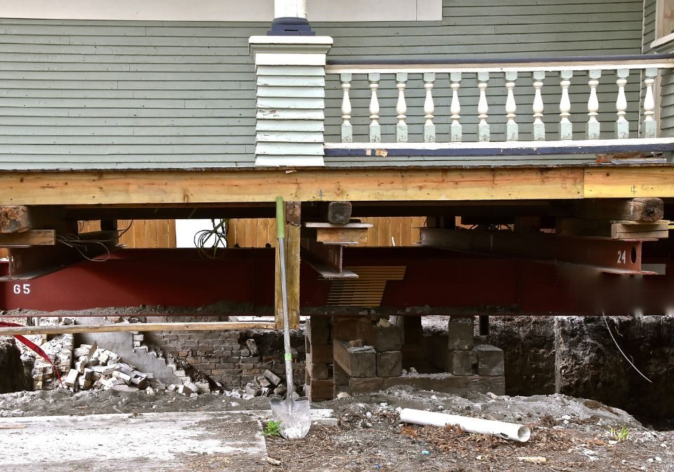 a home lifted off of its foundation