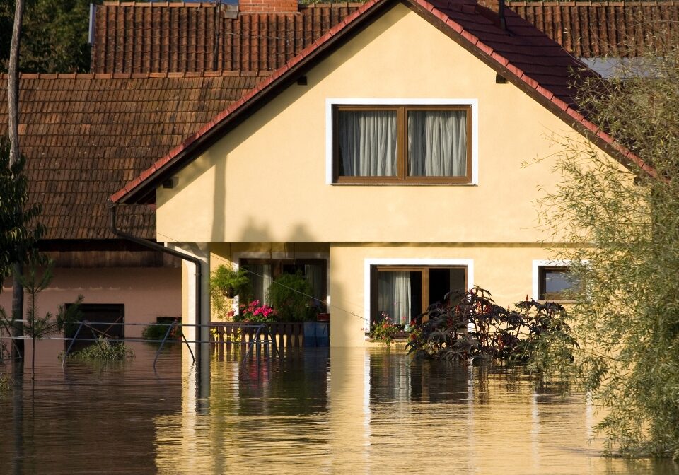 Flooded white building